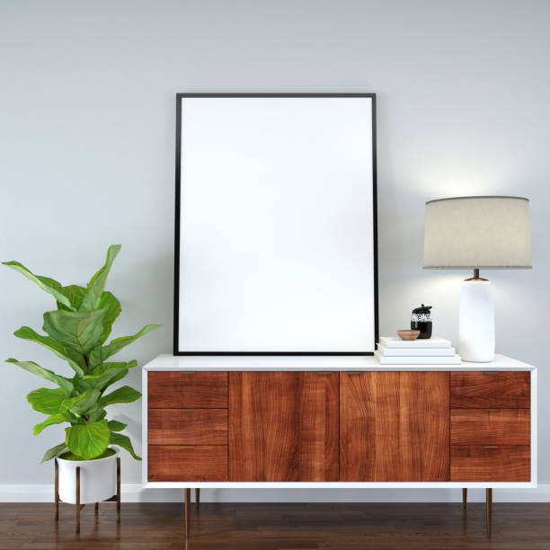 Mock up of poster frame in wooden floor modern interior top of table in living room with some trees isolated on light background, 3D render, 3D illustration stock photo