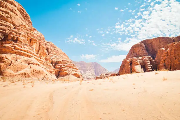 Wadi Rum Desert, Jordan. The red desert and Jabal Al Qattar mountain. Sand-dunes in Wadi-Rum desert, Jordan, Middle East