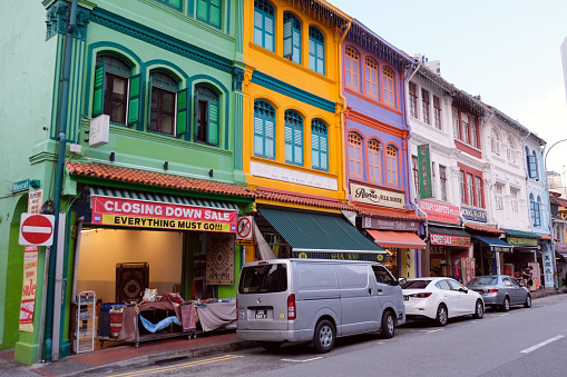 Arab Street in the Kampong Glam neighborhood, with shophouses on both sides of the street. Downtown Singapore