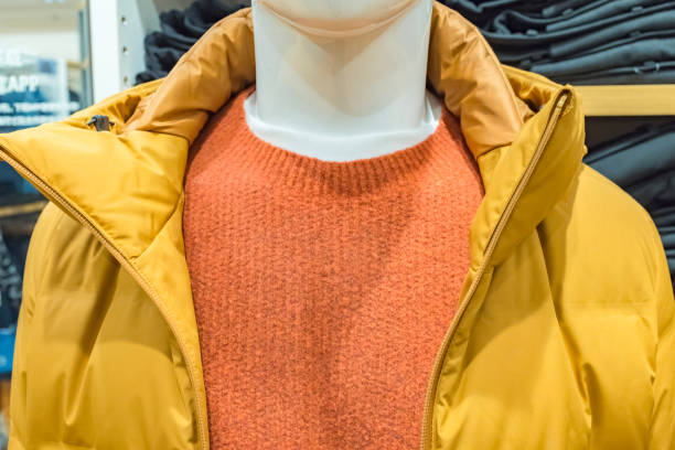 Suits on mannequins in clothing store