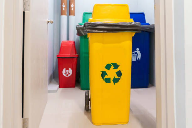 istock Yellow trash dustbin for Recyclable waste and Red, green and blue for Hazardous, Biodegradable and General waste. recycling management, waste segregation, garbage and rubbish concept 1438853304
