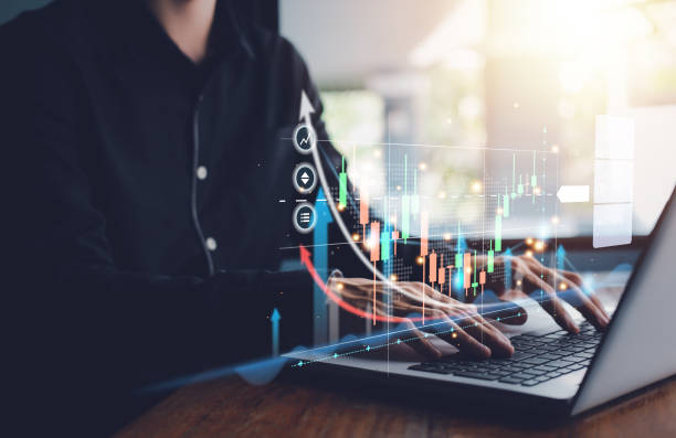 istock Buy and Sell. Stock chart or cryptocurrency chart with businessman hand typing notebook (Laptop). Statistics graph and char growing graph. Success business concept. 1438854454
