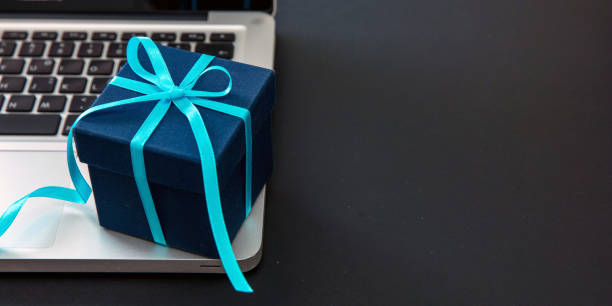 istock Cyber Monday Sale. Gift box and computer laptop, copy space 1438854858