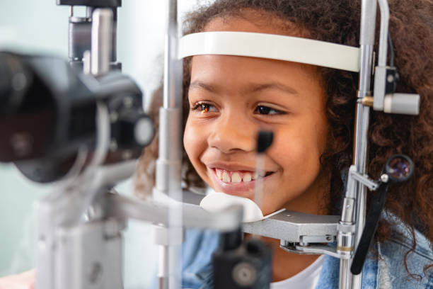 istock An Optometrist Checking Young Girl's Vision With Trial Frame 1438856922