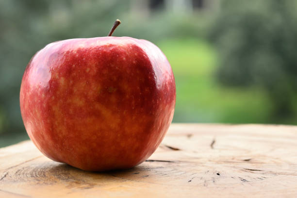 istock Close up of apple type with red, white, yellow and pink pulp 1438859897