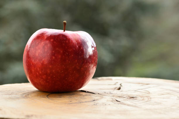istock Close up of apple type with red, white, yellow and pink pulp 1438859911