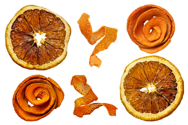 Dried orange slices and orange peel isolated on white background