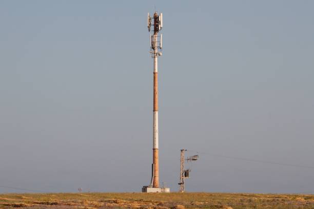 istock Automated weather observation system in the field on blue sky background 1438862806