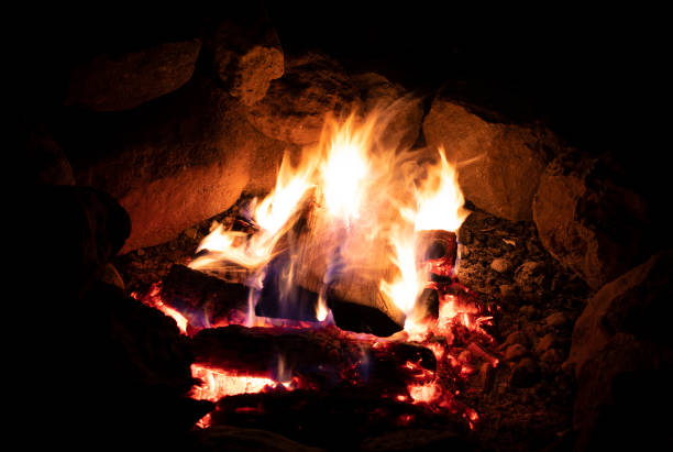 istock Logs finally catching in the campfire 1438863540