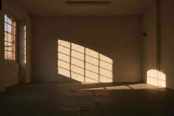 istock Interior shot of an empty room with white walls 1438863785