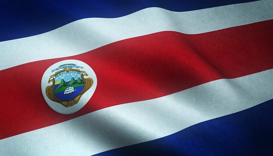 A closeup shot of the waving flag of Costa Rica with interesting textures