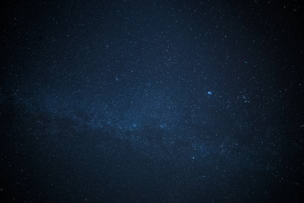 istock Low-angle shot of a starry night sky 1438865299