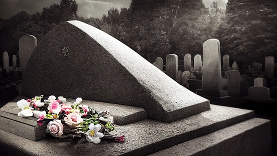 A color splash of flowers on a gravestone