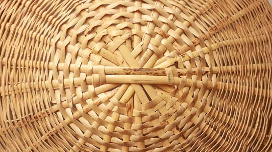 Multicolored Laundry Basket weaving with handle made from Pandanus odorifer or fragrant screw-pine on a white background for product photography