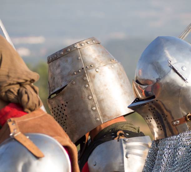 istock Group of Spanish medieval knights with helmets getting ready for a battle 1438866682