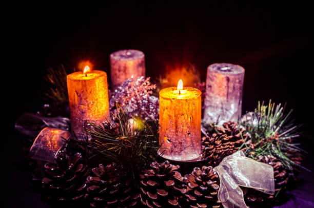 istock two burning candles on advent wreath 1438866848