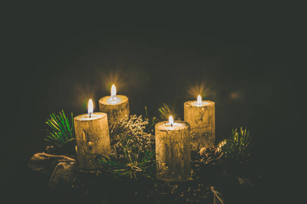 istock four burning candles on advent wreath 1438866981