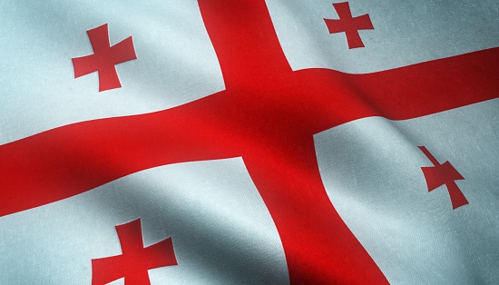 A closeup shot of the waving flag of Georgia with interesting textures