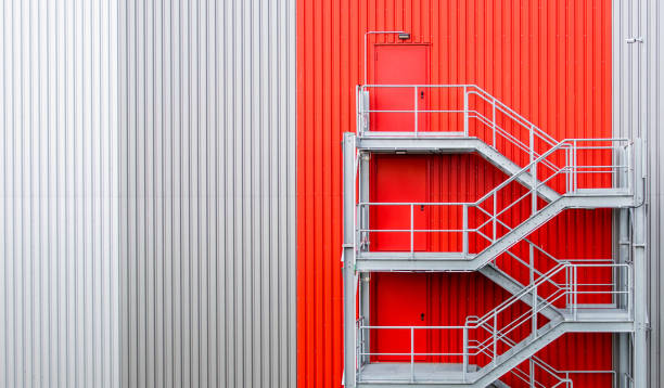 istock Closed Metal Staircase At Factory 1438867397