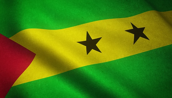 A closeup shot of the waving flag of Sao Tome and Principe with interesting textures