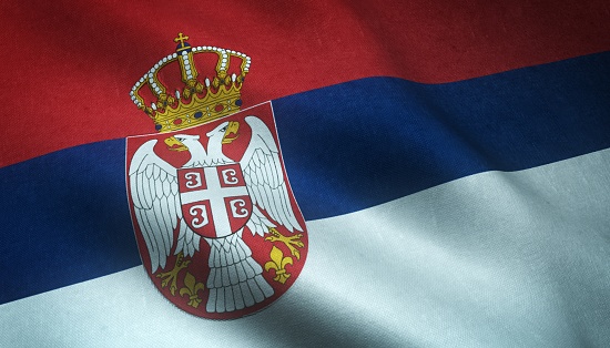 A closeup shot of the waving flag of Serbia with interesting textures