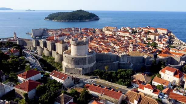 Aerial view of Dubrovnik cityscape with the Minceta Tower in Croatia on a sunny day An aerial view of Dubrovnik cityscape with the Minceta Tower in Croatia on a sunny day fort minceta dubrovnik stock pictures, royalty-free photos & images