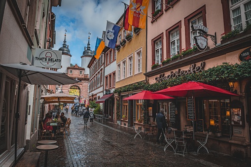 Heidelberg, Germany – September 17, 2022: The old, medieval streets of Heidelberg now with working hotels and restaurants, Germany