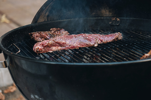 Appetizing meat grilled on barbecue grill