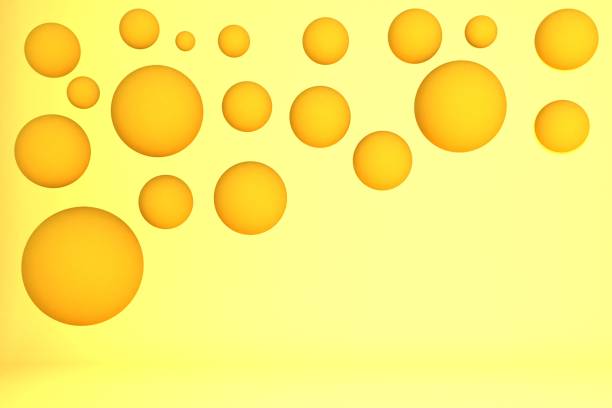 istock 3d rendering various golden spheres on a yellow background 1438871097