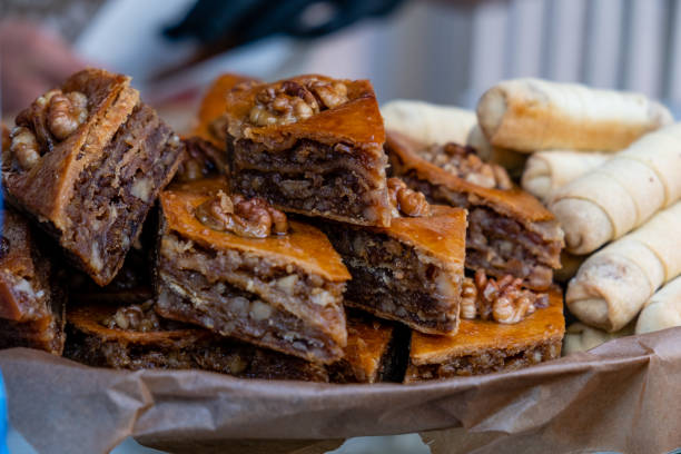istock A close-up of a dessert with nuts and honey. 1438871406