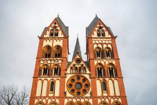 The Limburg cathedral under a cloudy sky and sunlight in Germany
