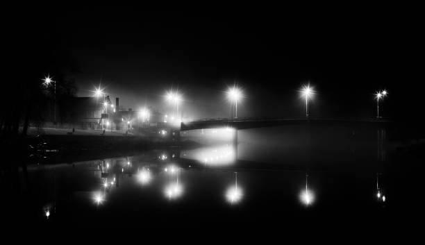 istock bridge on a foggy night 1438873488