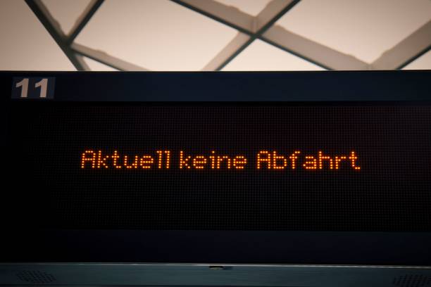 istock Closeup shot of a timetable in a train station 1438873634