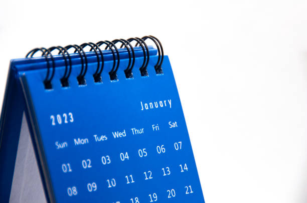 istock January 2023 blue desk calendar on white background. Calendar concept. 1438873672