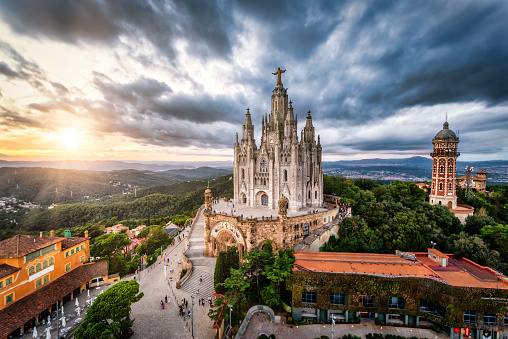 Aerial view of temple of the Sacred Heart of Jesus, Mount Tibidabo at sunset, Barcelona, Spain.