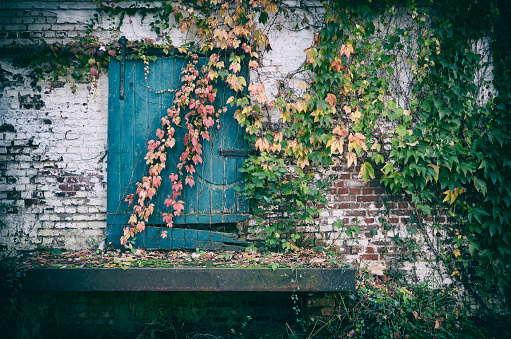 Toned photograph of a very old warehouse.