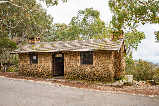 Old heritage stone building in the mountains with Australian bush land