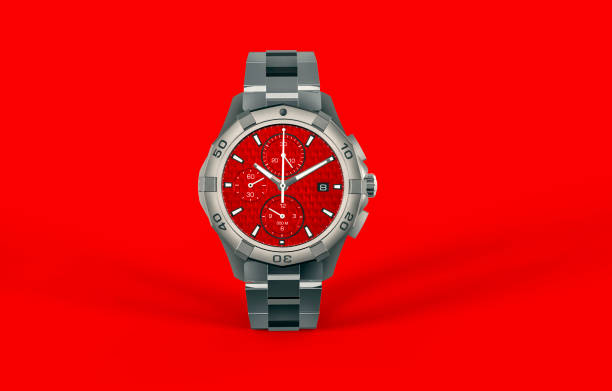 istock Red wristwatch isolated on red background 1438880949