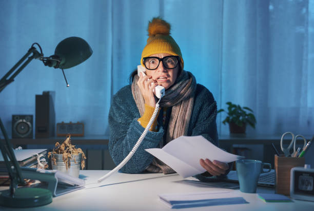 istock Shocked woman checking utility bills 1438881970