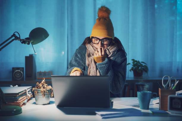 istock Woman feeling cold at home in winter 1438882017