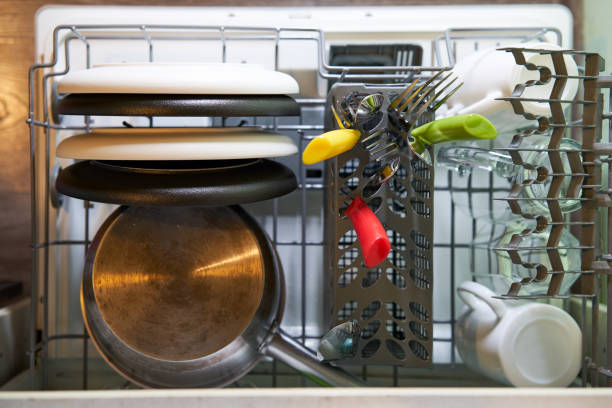 istock Washed dishes in the dishwasher. Top view. 1438883129