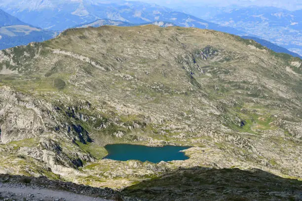 Photo of Elevated view of Lac du Brévent lake of the Red Needles (