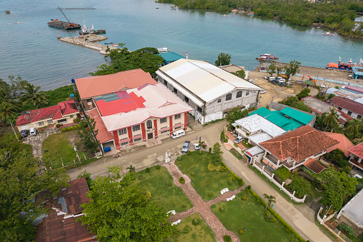 Loay, Bohol, Philippines - May 2022: Aerial of the town hall and the fish port of the municipality of Loay.
