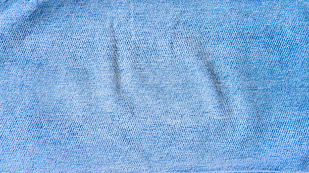 Denim jeans texture. Denim background texture for design. Canvas denim texture. Blue denim that can be used as background. Blue jeans texture for any background.