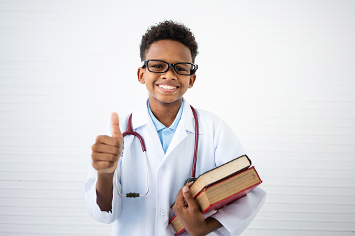 Little boy pretending to be a doctor