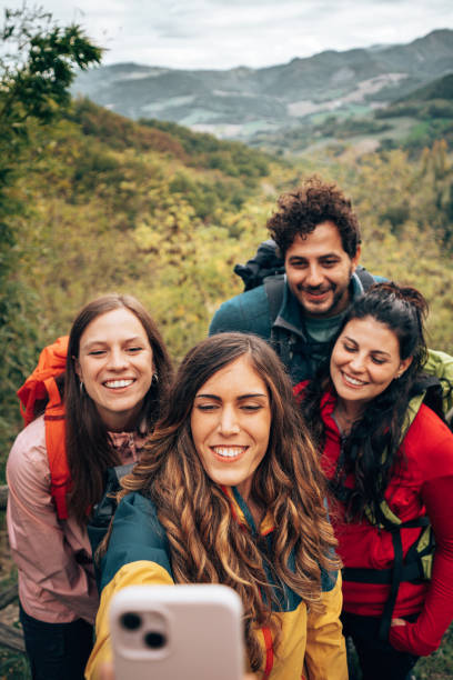 istock friends take a selfie during the trekking 1438893608