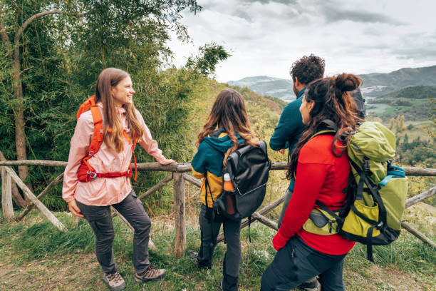istock friends on the weekend doing a trekking 1438894405