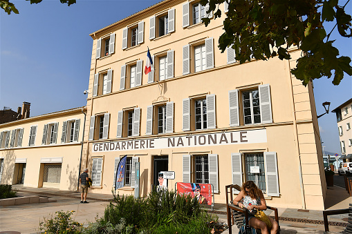 Saint-Tropez, France-10 27 2022: Visitors in front of the former building of the Gendarmerie of Saint-Tropez, France, which became famous throughout the world because the film  \