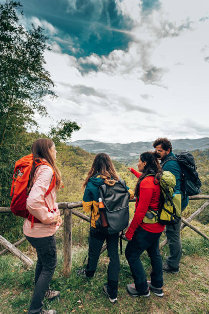 istock friends on the weekend doing a trekking 1438894686