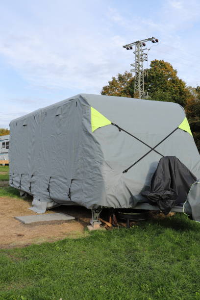 istock a caravan with a gray tarpaulin 1438897889
